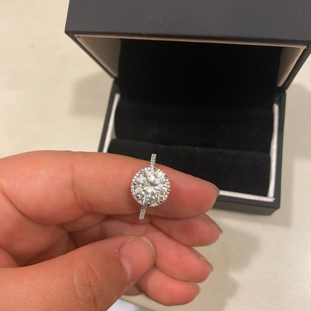 Cz engagement ring. 3 carat. Round with very small halo.